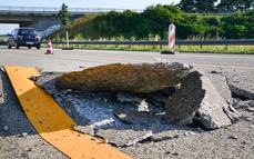A photograph made available on 03 July 2015 shows the German motorway, Autobahn 5, damaged due to the high temperatures near the motorway exit, Heidelberg/Schwetzingen, Heidelberg, Germany, 02 July 2015. Photo: René Priebe/dpa | usage worldwide   (Photo by Rene Priebe/picture alliance via Getty Images)