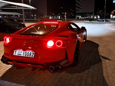 Epic red Ferrari red at night in Dubai- Dubai, UAE, June 11, 2019