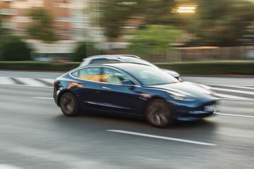 Madrid, Spain - 16 October, 2019: An electric Tesla Model S car in motion in an avenue of Madrid, Spain.