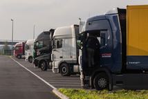 Haulage trucks at a roadside parking area on the European E40 route highway in Gistel, Belgium, on Tuesday, Nov. 24, 2020. European Commission President Ursula von der Leyen said the coming days will be “decisive” for trade negotiations with the U.K. and crucial differences between the two sides remain. Photographer: Geert Vanden Wijngaert/Bloomberg