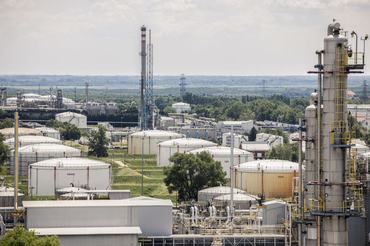 Oil storage tanks and refining towers at the Duna oil refinery, operated by MOL Hungarian Oil & Gas Plc, in Szazhalombatta, Hungary, on Thursday, May 26, 2022. Hungarian Prime Minister Viktor Orban said there was no consensus among European Union leaders on banning Russian oil but signaled he was ready to agree if the bloc guarantees his country still receives the fuel via a pipeline and other measures in case that avenue is disrupted. Photographer: Akos Stiller/Bloomberg via Getty Images
