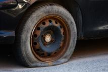 Flat tire is seen in a car in Krakow, Poland on June 22, 2022. (Photo by Jakub Porzycki/NurPhoto via Getty Images)
