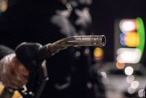A customer prepares to refuel a vehicle at a MOL Hungarian Oil & Gas Plc gas station in Budapest, Hungary, on Monday, Dec. 5, 2022. The countrys biggest oil company, Mol, is struggling to meet demand after its Danube Refinery reduced output for unplanned maintenance just as state price caps drove up fuel consumption. Photographer: Akos Stiller/Bloomberg via Getty Images