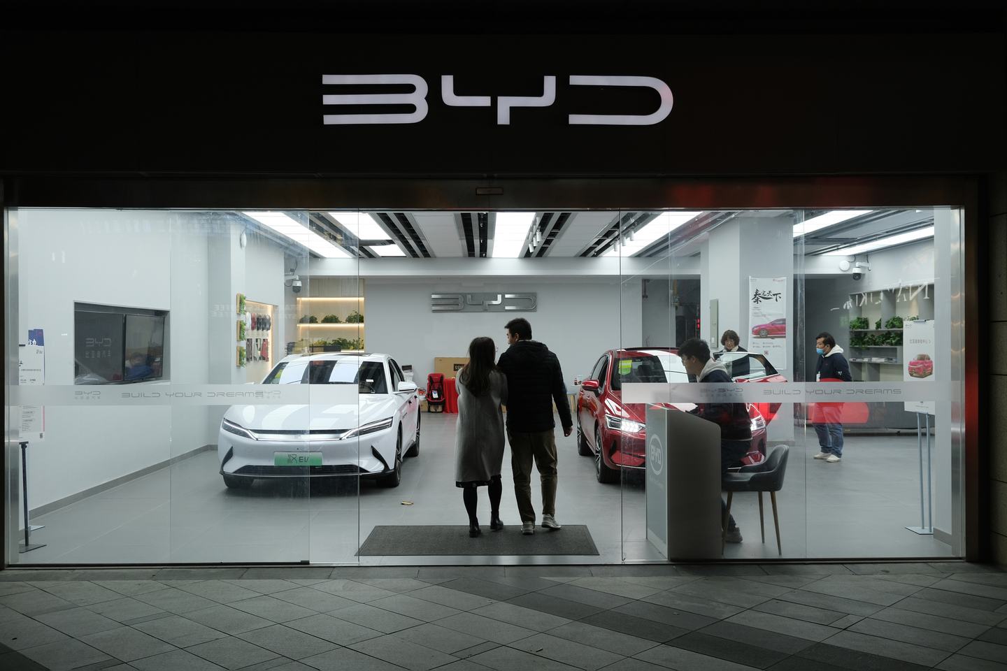 Shanghai.China-nov.27th 2021: BYD EV car store and customers. BYD is a Chinese electric car company