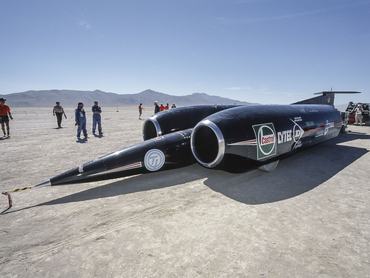 BLACK ROCK DESERT, NV - SEPTEMBER 1997:  The Thrust SSC car sits on the Black Rock Desert during the land speed record attempt in September 1997 north of Reno, Nevada; the car, driven by Andy Green, eventually set the land speed record on October 15, 1997 of 1228 kilometers per hour.  (Photo by David Madison/Getty Images)