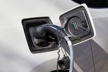 Charging an electric car on the street