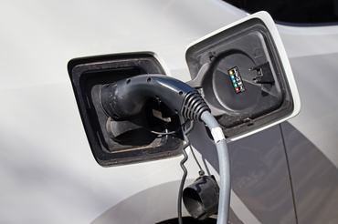 Charging an electric car on the street