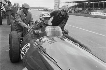 Brazilian racing driver Hermano da Silva Ramos, seated in his Maserati 250F with the number 17, is given a push at the  11th BRDC International Trophy race at Silverstone circuit in Northamptonshire, February 5th 1959. (Photo by Evening Standard/Hulton Archive/Getty Images)