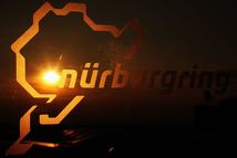NUERBURG, GERMANY - JULY 06:  (EDITORS NOTE: THIS IMAGE WAS FLIPPED FROM ITS ORIGINAL PERSPECTIVE) Nurburgring logo is seen on a window following qualifying for the German Grand Prix at the Nuerburgring on July 6, 2013 in Nuerburg, Germany.  (Photo by Ker Robertson/Getty Images)