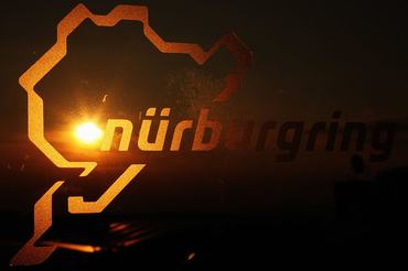 NUERBURG, GERMANY - JULY 06:  (EDITORS NOTE: THIS IMAGE WAS FLIPPED FROM ITS ORIGINAL PERSPECTIVE) Nurburgring logo is seen on a window following qualifying for the German Grand Prix at the Nuerburgring on July 6, 2013 in Nuerburg, Germany.  (Photo by Ker Robertson/Getty Images)