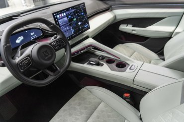 A Geely Automobile Holdings Ltd. Zeekr 001 electric vehicle at the Zeekr Center in Shanghai, China, on Saturday, May 11, 2024. Shares of Zeekr Intelligent Technology Holding Ltd., the high-end electric car brand under Zhejiang Geely Holding Group Co., rose 35% after an expanded initial public offering that's the biggest US listing by a China-based company since 2021. Photographer: Qilai Shen/Bloomberg via Getty Images