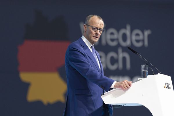 BERLIN, GERMANY - FEBRUARY 03: Friedrich Merz, chancellor candidate and leader of the Christian Democrats (CDU), speaks to delegates at a CDU party congress on February 03, 2025 in Berlin, Germany. The congress is taking place following Merz's recent controversial move in the Bundestag, in which he sought to push through legislation on immigration and security, knowing it depended on support for the far-right Alternative for Germany (AfD). Germany faces snap parliamentary elections on February 23. (Photo by Maja Hitij/Getty Images)