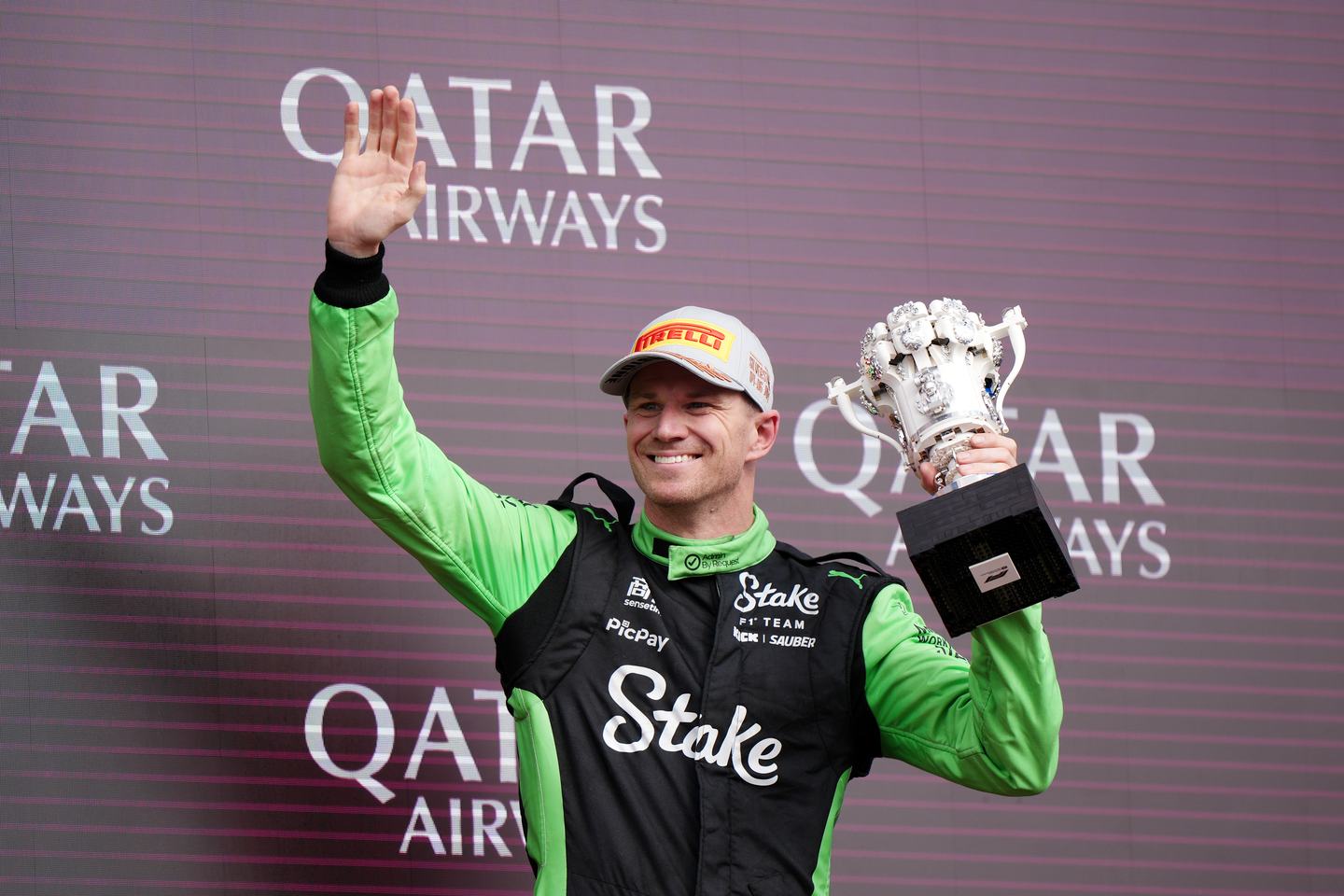 Kick Sauber driver Nico Hulkenberg celebrates with the lego trophy on the podium after finishing third in the British Grand Prix at Silverstone Circuit, Northamptonshire. Picture date: Sunday July 6, 2025. (Photo by Bradley Collyer/PA Images via Getty Images)