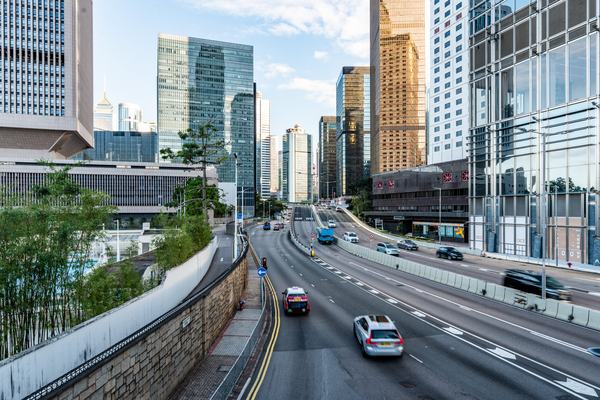 Modern architecture structuring the busy streets of hong kong's financial district