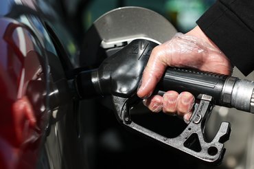 A person refuels a car at the gas station in Jedrzejow, Poland on March 2, 2026. (Photo by Jakub Porzycki/NurPhoto via Getty Images)