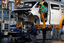 HANOVER, GERMANY - MARCH 4: A worker assembles a  VW ID. Buzz electric van at the Volkswagen commercial vehicles van and bus factory on March 4, 2026 in Hanover, Germany. Volkswagen, Germany's biggest car maker, is scheduled to announce financial results on March 10. (Photo by Christian Ender/Getty Images)