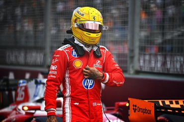 MELBOURNE, AUSTRALIA - MARCH 07: Seventh placed qualifier Lewis Hamilton of Great Britain and Scuderia Ferrari walks in parc ferme during qualifying ahead of the F1 Grand Prix of Australia at Albert Park Grand Prix Circuit on March 07, 2026 in Melbourne, Australia. (Photo by James Sutton - Formula 1/Formula 1 via Getty Images)