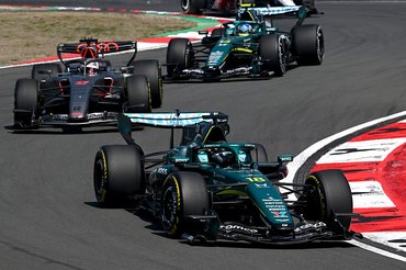 SHANGHAI, CHINA - MARCH 14: Lance Stroll of Canada driving the (18) Aston Martin F1 Team AMR26 Honda leads Nico Hulkenberg of Germany driving the (27) Audi F1 Team R26 and Fernando Alonso of Spain driving the (14) Aston Martin F1 Team AMR26 Honda on track during the Sprint ahead of the F1 Grand Prix of China at Shanghai International Circuit on March 14, 2026 in Shanghai, China. (Photo by Mark Sutton - Formula 1/Formula 1 via Getty Images)