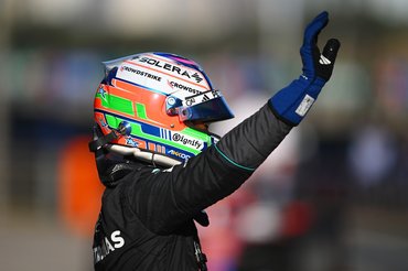 SHANGHAI, CHINA - MARCH 14: Pole position qualifier Andrea Kimi Antonelli of Italy and Mercedes AMG Petronas F1 Team waves from parc ferme during qualifying ahead of the F1 Grand Prix of China at Shanghai International Circuit on March 14, 2026 in Shanghai, China. (Photo by Rudy Carezzevoli/Getty Images)