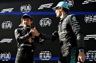 SHANGHAI, CHINA - MARCH 14: Pole position qualifier Andrea Kimi Antonelli of Italy and Mercedes AMG Petronas F1 Team and Second placed qualifier George Russell of Great Britain and Mercedes AMG Petronas F1 Team congratulate each other in parc ferme during qualifying ahead of the F1 Grand Prix of China at Shanghai International Circuit on March 14, 2026 in Shanghai, China. (Photo by Mark Sutton - Formula 1/Formula 1 via Getty Images)