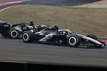 SHANGHAI, CHINA - MARCH 15: Valtteri Bottas of Finland driving the (77) Cadillac F1 Team MAC-26 Ferrari leads Sergio Perez of Mexico driving the (11) Cadillac F1 Team MAC-26 Ferrari on track during the F1 Grand Prix of China at Shanghai International Circuit on March 15, 2026 in Shanghai, China. (Photo by Mark Thompson/Getty Images)