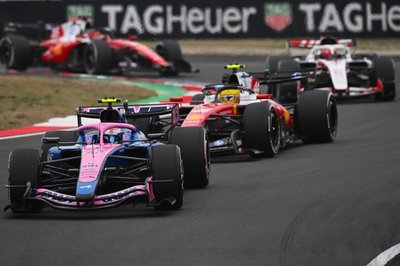 SHANGHAI, CHINA - MARCH 15: Franco Colapinto of Argentina driving the (43) Alpine F1 A526 Mercedes leads Lewis Hamilton of Great Britain driving the (44) Scuderia Ferrari SF-26 on track during the F1 Grand Prix of China at Shanghai International Circuit on March 15, 2026 in Shanghai, China. (Photo by Rudy Carezzevoli/Getty Images)