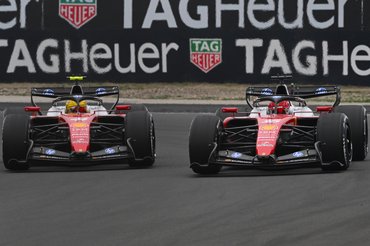 SHANGHAI, CHINA - MARCH 15: Lewis Hamilton of Great Britain driving the (44) Scuderia Ferrari SF-26 and Charles Leclerc of Monaco driving the (16) Scuderia Ferrari SF-26 battle for track position during the F1 Grand Prix of China at Shanghai International Circuit on March 15, 2026 in Shanghai, China. (Photo by Rudy Carezzevoli/Getty Images)