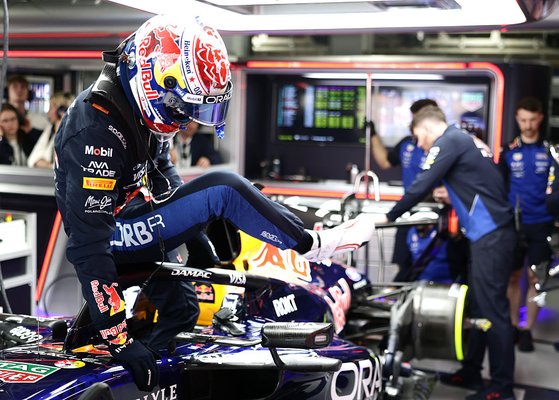 SUZUKA, JAPAN - MARCH 28: Eleventh placed qualifier Max Verstappen of the Netherlands and Oracle Red Bull Racing jumps out of his car in the garage during qualifying ahead of the F1 Grand Prix of Japan at Suzuka Circuit on March 28, 2026 in Suzuka, Japan. (Photo by Mark Thompson/Getty Images)