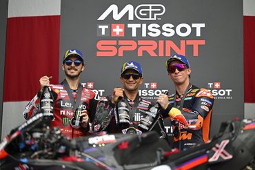 AUSTIN, TEXAS - MARCH 28: Francesco Bagnaia of Italy riding the Lenovo Ducati (63), Jorge Martin of Spain riding the Aprilia Racing bike (89) and Pedro Acosta of Spain riding the Red Bull KTM Factory Racing bike (37) on the podium during the Sprint ahead of the MotoGP of United States at Circuit of The Americas on March 28, 2026 in Austin, Texas. (Photo by Gold & Goose Photography/Getty Images)