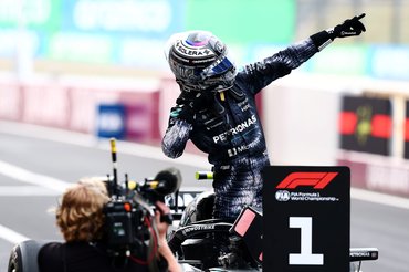SUZUKA, JAPAN - MARCH 29: Race winner Andrea Kimi Antonelli of Italy and Mercedes AMG Petronas F1 Team celebrates in parc ferme during the F1 Grand Prix of Japan at Suzuka Circuit on March 29, 2026 in Suzuka, Japan. (Photo by Clive Rose - Formula 1/Formula 1 via Getty Images)