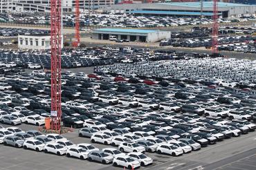 New energy vehicles are prepared for loading onto ships at the Shanghai Port Automotive Export Terminal in Shanghai, China, on April 14, 2026. (Photo by Costfoto/NurPhoto via Getty Images)