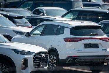 BRISTOL, UNITED KINGDOM - APRIL 22: Brand new recently imported Chinese Chery cars are displayed for sale outside a dealership on April 22, 2026 in Bristol, England. Having previously sold very few vehicles in the UK and European Union, Chinese car brands are rapidly expanding their market share, offering competitive priced, electric (EV) and hybrid vehicles, with many of new UK registered cars being Chinese-owned brands in 2026.(Photo by Anna Barclay/Getty Images)