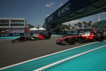MIAMI, FLORIDA - MAY 01: Nico Hulkenberg of Germany driving the (27) Audi F1 Team R26 leads Lewis Hamilton of Great Britain driving the (44) Scuderia Ferrari SF-26 on track during practice ahead of the F1 Grand Prix of Miami at Miami International Autodrome on May 01, 2026 in Miami, Florida. (Photo by Chris Graythen/Getty Images)