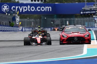 MIAMI, FLORIDA - MAY 03: The FIA Safety Car leads Charles Leclerc of Monaco driving the (16) Scuderia Ferrari SF-26 on track during the F1 Grand Prix of Miami at Miami International Autodrome on May 03, 2026 in Miami, Florida. (Photo by Mark Thompson/Getty Images)
