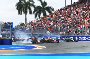 MIAMI, FLORIDA - MAY 03: Max Verstappen of the Netherlands driving the (3) Oracle Red Bull Racing RB22 Red Bull Ford Charles Leclerc of Monaco driving the (16) Scuderia Ferrari SF-26 and Andrea Kimi Antonelli of Italy driving the (12) Mercedes AMG Petronas F1 Team W17 lead the field at the start during the F1 Grand Prix of Miami at Miami International Autodrome on May 03, 2026 in Miami, Florida. (Photo by Alastair Staley/LAT Images)