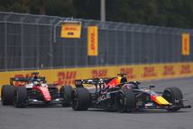 MIAMI, FLORIDA - MAY 03: Max Verstappen of the Netherlands driving the (3) Oracle Red Bull Racing RB22 Red Bull Ford leads Charles Leclerc of Monaco driving the (16) Scuderia Ferrari SF-26 on track during the F1 Grand Prix of Miami at Miami International Autodrome on May 03, 2026 in Miami, Florida. (Photo by Andy Hone/LAT Images)