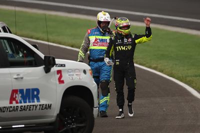 INDIANAPOLIS, INDIANA - MAY 24: Will Power, driver of the #26 Andretti Global Honda walks to a safety vehicle after a wreck during the NTT IndyCar Series 110th Running of the Indianapolis 500 at Indianapolis Motor Speedway on May 24, 2026 in Indianapolis, Indiana. (Photo by James Gilbert/Getty Images)