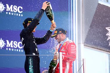 CIRCUIT DE CATALUNYA, BARCELONA, SPAIN - 2026/06/14: George Russell of Mercedes-AMG F1 Team  (L) and Lewis Hamilton of Scuderia Ferrari HP (R) celebrate on the podium during  the F1 Grand Prix of Catalunya . (Photo by Marco Canoniero/LightRocket via Getty Images)