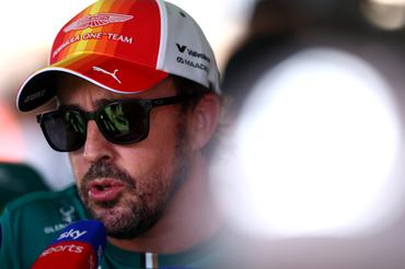 BARCELONA, SPAIN - JUNE 13: Twenty-second placed qualifier Fernando Alonso of Spain and Aston Martin F1 Team is interviewed during qualifying ahead of the F1 Grand Prix of Barcelona-Catalunya at Circuit de Barcelona-Catalunya on June 13, 2026 in Barcelona, Spain. (Photo by Clive Rose/Getty Images)