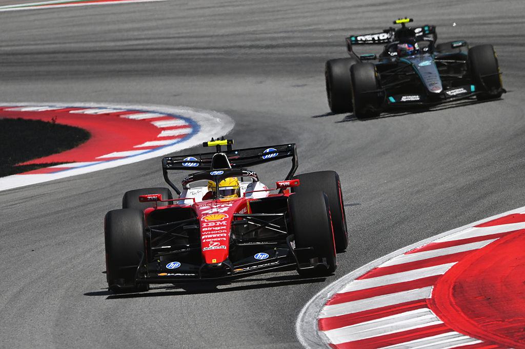 BARCELONA, SPAIN - JUNE 14: Lewis Hamilton of Great Britain driving the (44) Scuderia Ferrari SF-26 leads Andrea Kimi Antonelli of Italy driving the (12) Mercedes AMG Petronas F1 Team W17 on track during the F1 Grand Prix of Barcelona-Catalunya at Circuit de Barcelona-Catalunya on June 14, 2026 in Barcelona, Spain. (Photo by Rudy Carezzevoli/Getty Images)