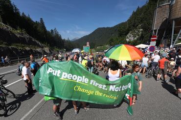 27 June 2026, Austria, Reutte: Protesters stand alongside the closed B179 Fernpass Road during a rally. Photo: Karl-Josef Hildenbrand/dpa (Photo by Karl-Josef Hildenbrand/picture alliance via Getty Images)