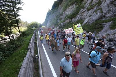 27 June 2026, Austria, Reutte: Protesters are marching in a demonstration along the closed B179 Fernpass Road toward a rally. Photo: Karl-Josef Hildenbrand/dpa (Photo by Karl-Josef Hildenbrand/picture alliance via Getty Images)
