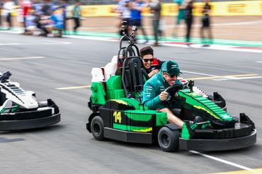 NORTHAMPTON, ENGLAND - JULY 05: Fernando Alonso of Spain and Aston Martin F1 Team drives a Lego Minicar on the drivers parade prior to the F1 Grand Prix of Great Britain at Silverstone Circuit on July 05, 2026 in Northampton, England. (Photo by Peter Fox/Getty Images)