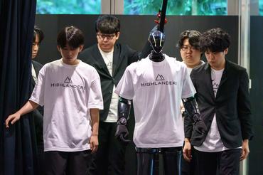TOKYO, JAPAN - JULY 09: A humanoid robot named N, manufactured by Highlanders Inc., is demonstrated at the Mitsubishi Motors Corp. headquarters on July 09, 2026, in Tokyo, Japan. Mitsubishi Motors and Highlanders unveiled a prototype of a humanoid robot capable of transporting automobile parts and assembling engines on a production line. The robot is scheduled to enter mass production in Japan in 2027. (Photo by Tomohiro Ohsumi/Getty Images)