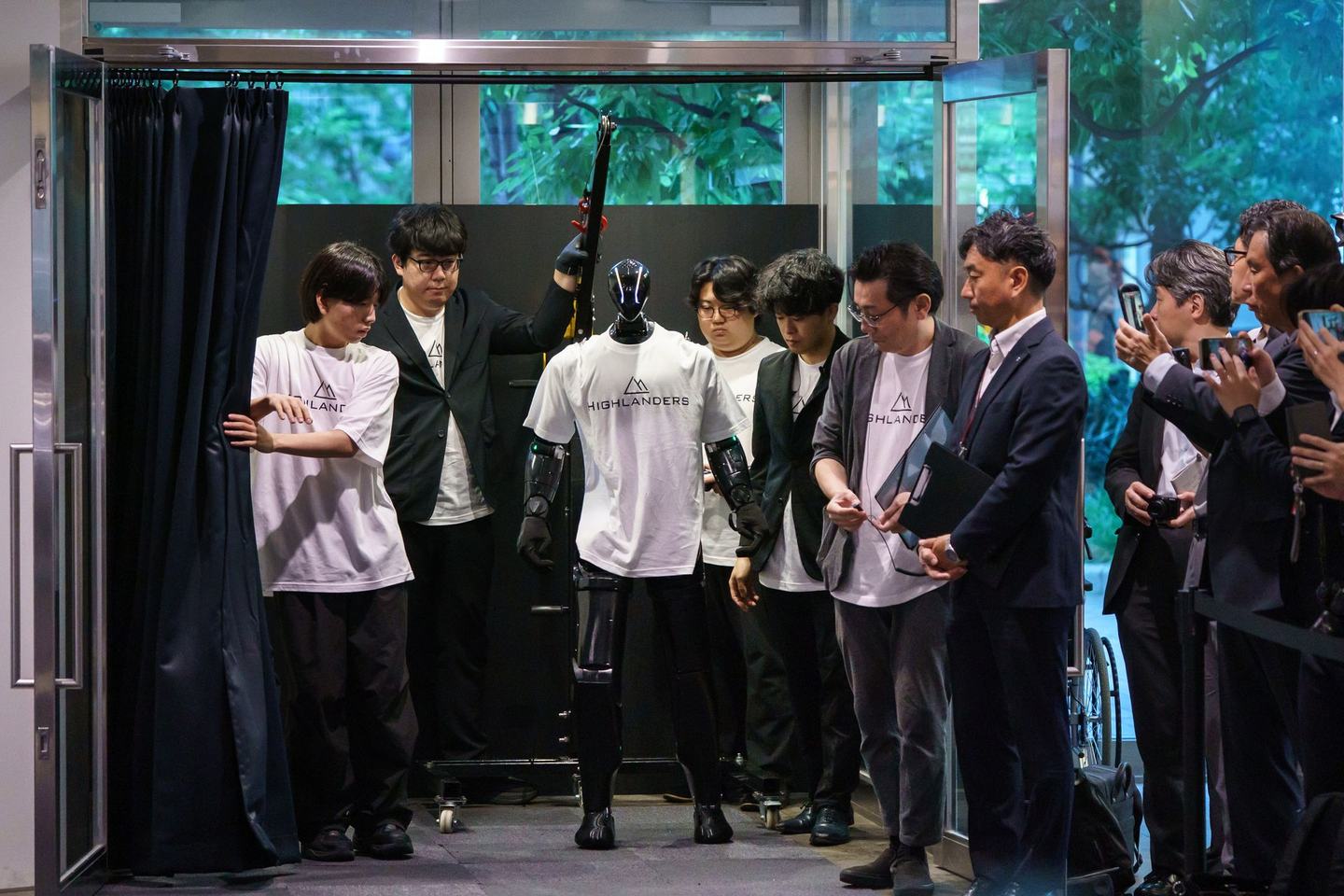 TOKYO, JAPAN - JULY 09: A humanoid robot named N, manufactured by Highlanders Inc., is demonstrated at the Mitsubishi Motors Corp. headquarters on July 09, 2026, in Tokyo, Japan. Mitsubishi Motors and Highlanders unveiled a prototype of a humanoid robot capable of transporting automobile parts and assembling engines on a production line. The robot is scheduled to enter mass production in Japan in 2027. (Photo by Tomohiro Ohsumi/Getty Images)