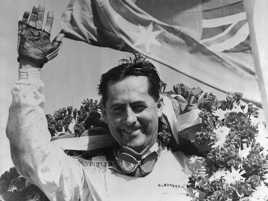 (Original Caption) Picture shows Jack Brabham, Australian, became the world champion racing driver for the third time with an unassailable points lead in the championship race after the Grand Prix on Sept. 4, 1966. This year he is also the world champion constructor. 9/4/1966