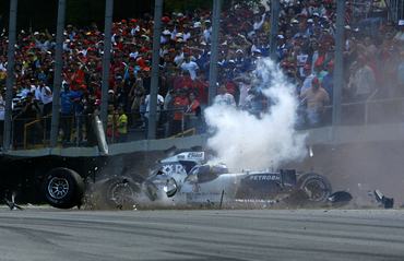 SAO PAULO, BRAZIL - OCTOBER 22:  Nico Rosberg of Germany and Williams crashes into the wall in the Brazilian Formula One Grand Prix at the Autodromo Interlagos on October 22, 2006 in Sao Paulo, Brazil.  (Photo by Paul Gilham/Getty Images)