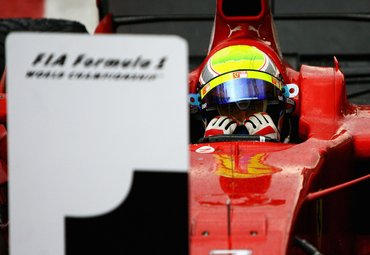 SAO PAULO, BRAZIL - NOVEMBER 02:  Felipe Massa of Brazil and Ferrari looks disappointed in parc ferme after winning the race but losing the World Championship at the Brazilian Formula One Grand Prix at the Interlagos Circuit on November 2, 2008 in Sao Paulo, Brazil.  (Photo by Clive Mason/Getty Images)