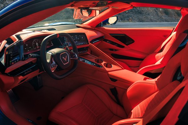 The 2027 Chevrolet Corvette Grand Sport in Adrenaline Red Dipped interior.